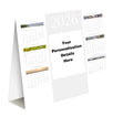 A freestanding  desk calendar shown on a white background, with monthly grids visible and room for your personalisation details in the centre.