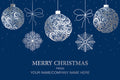 Decorative Christmas card with ornaments and snowflakes on a blue background