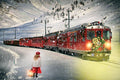 Red train traveling through a snowy mountain landscape with a person holding a lantern.