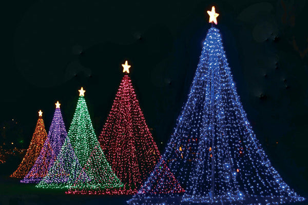 Decorative Christmas trees made of lights on a dark background