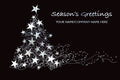 Season's Greetings card with a starry Christmas tree design on a black background