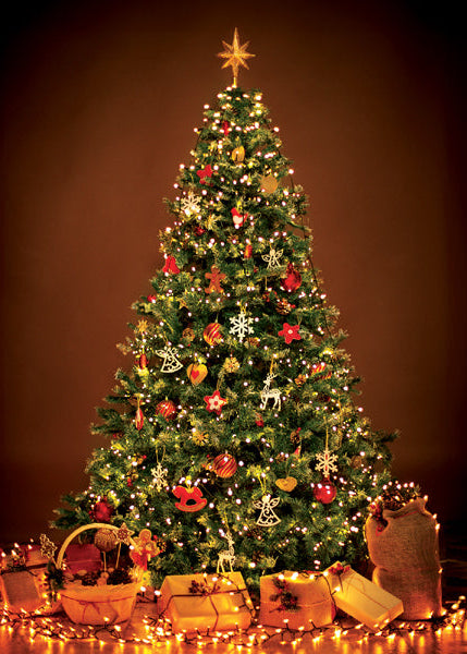 Decorated Christmas tree with lights and ornaments against a brown background