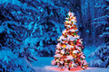 Decorated Christmas tree in a snowy forest