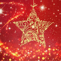 A decorative gold hanging ornament shaped like a five-pointed star with intricate floral and scroll patterns, set against a red and gold glittery background with starburst effects.