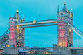 Tower Bridge in London at dusk with colorful lighting