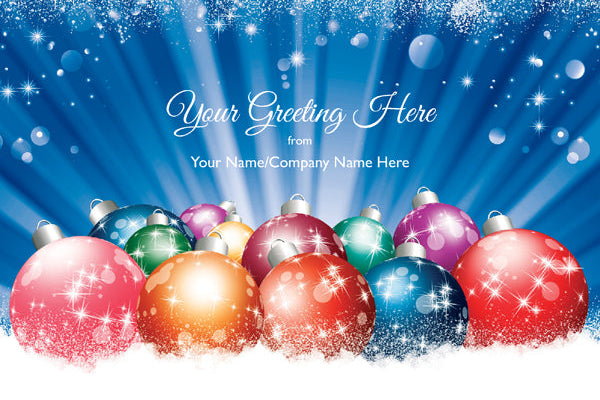 Colorful Christmas ornaments with a blue background and text space for greetings and names.