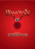 A festive Christmas graphic with a red background, a reindeer head made from antlers, large eyes, a fuzzy red nose, and warm string lights across the antlers, with the text 'MERRY CHRISTMAS' below.