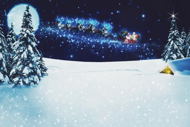 Santa Claus in a sleigh with reindeer flying over a snowy landscape at night.