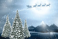 Winter landscape with snow-covered trees, mountains, and Santa Claus in a sleigh with reindeer.